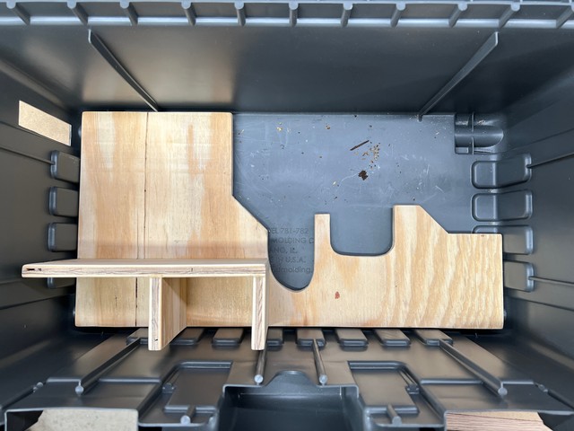 Cut out some scrap 1/2" plywood to secure the saw and accessories.