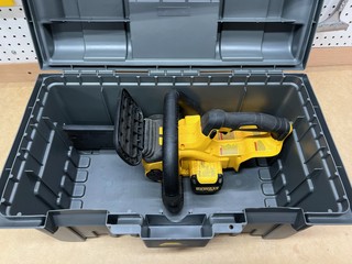 DeWalt Chainsaw in the Plano case. Lid closes when the chain brake pushed forward. Perfect fit.