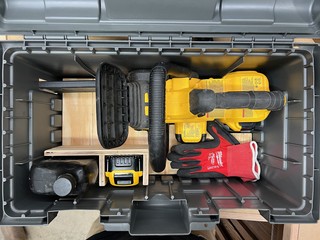 Chainsaw, Bar Oil, Spare battery, and gloves securely stored. Well balanced with enough room to t...