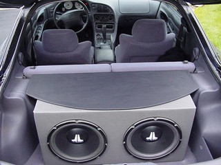 I covered the old box in vinyl and added the top to it to make it blend into the car a little better