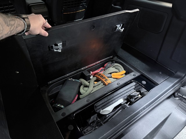 Underside of the hatch with the latches. I placed the latches so that the levers slide and latch underneath the metal cut out.