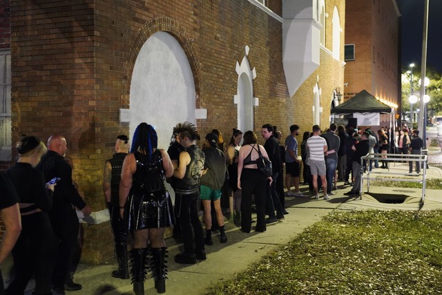 The piercer tipped us off to a goth club called the Castle. This was the line.