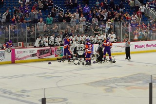 A whole team fight right in front of the visitors' bench, hahah. This game was wild