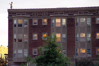 Some chick on a building