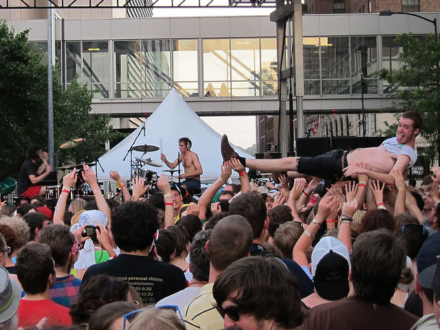 Crowd surfing at Dan Deacon