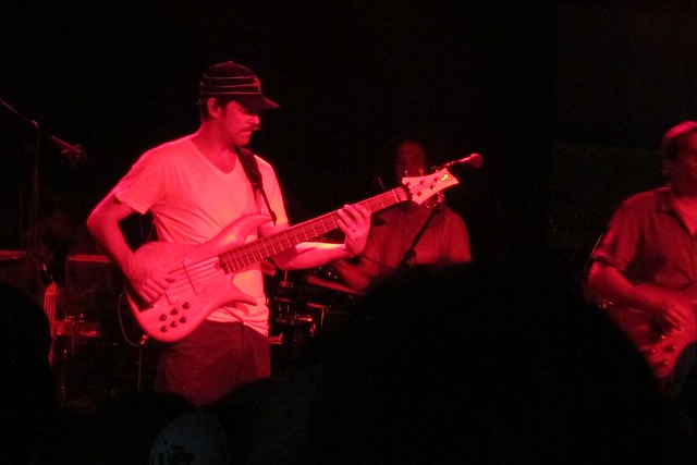 Blurry. Red. Umphrey's McGee bassist