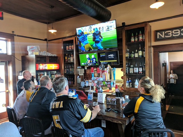 Iowa Football fans at rad little bar at the Minburn checkpoint