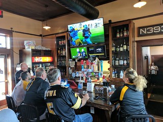 Iowa Football fans at rad little bar at the Minburn checkpoint