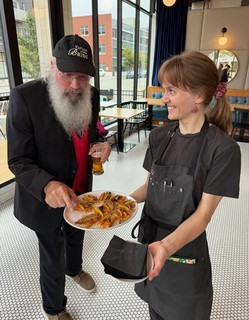 Focaccia with romesco, piparra pepper and a marinated maitake