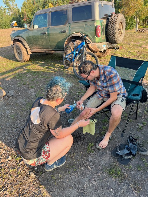 Cleaning up Jon's mountain bike wound