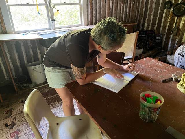 Signing the book at Club Superior