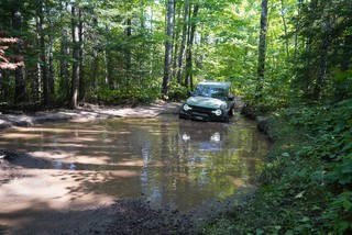 Jon dips into the deep puddle