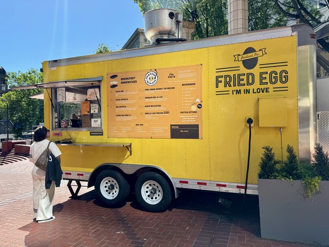 Checked in early and grabbing some breakfast sandwiches at Fried Egg I'm in Love