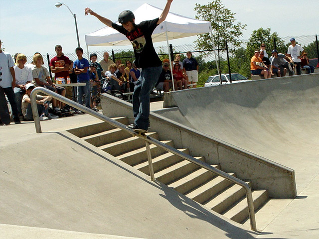 Backside boardslide down the handrail