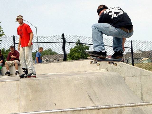 Kyle Pitman with a mute grab over the spine