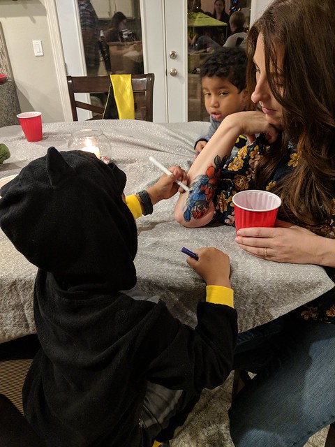 Nicole gettin her tattoo colored in