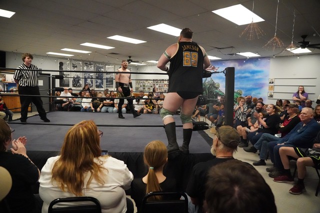 Jameson McGregor entering the ring with Kit Sackett

