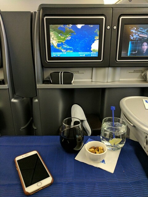 Sat down in business class and was offered Italian wine, nuts, and a sparkling water.