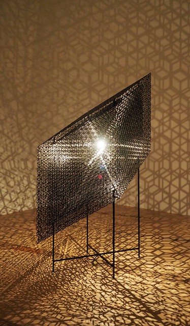 There were 2 lights that moved through this geometric piece of art to create the raddest, constan...