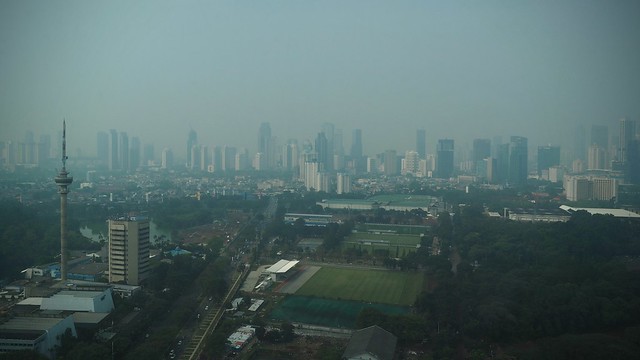 A smoggy view of Jakarta from the top of Hotel Mulia