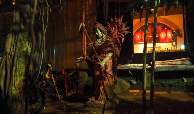 A sculpture in the side yard