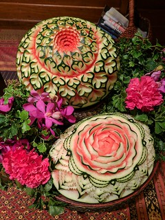 Art - There was a woman at the front of the restaurant intricately carving up these watermelons.