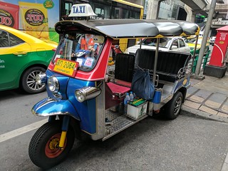 The tuk tuks in Bangkok . kinda look like carnival rides from the 60s
