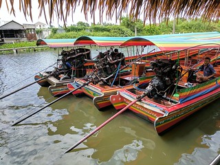 The boats that navigate the canals have these huge, pivoting car engines with props on the end of their driveshafts