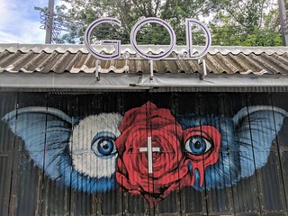 Art - A nice gremilin painting at some store called GOD. It unfortunately appeared to be closed that day