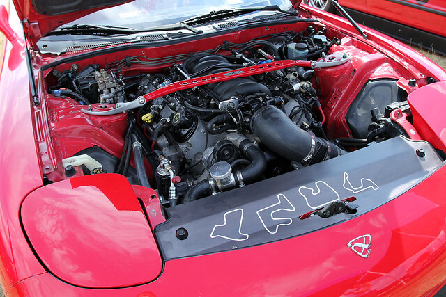 LS1 in an RX7... with some stickers to rep Jon's street cred