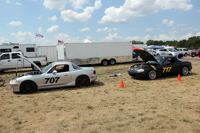 A couple miatas chilling out beside the track.