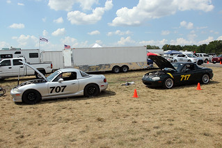 A couple miatas chilling out beside the track.