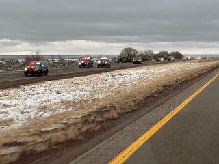 Westbound exits closed with 6,000 cops in procession.
