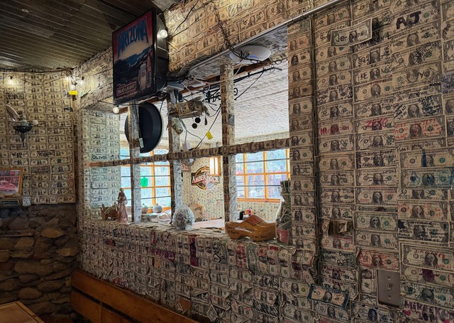 Superstition Saloon is completely wallpapered in dollar bills