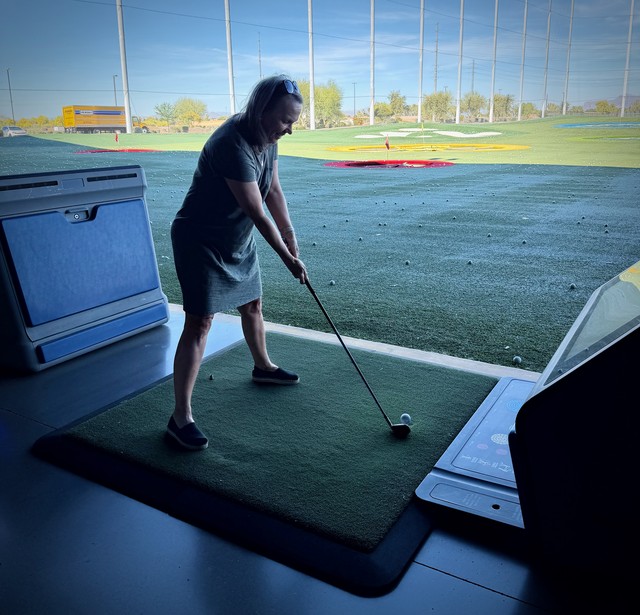Teresa's first golf swings