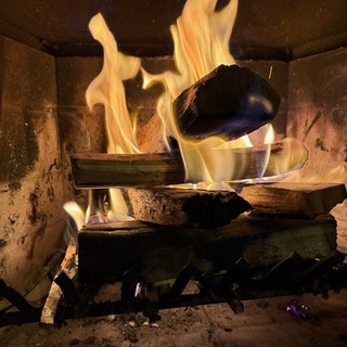 The hotel rooms at Post Hotel have wood burning fire places.