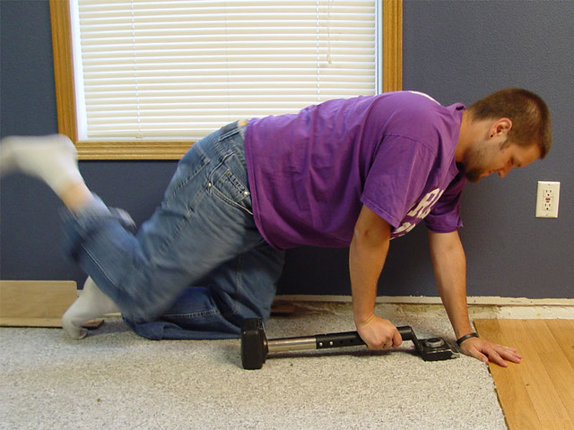 Stretching Carpet with the Knee Kicker