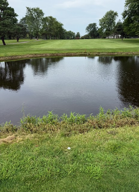 It was 270 yards to clear this pond. I went for it and landed at 271.