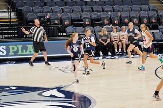 Randomly wound up watching Josh's daughter play basketball at the Target center, haha