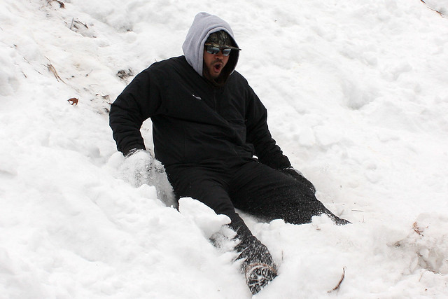 Nathan sliding down the hill