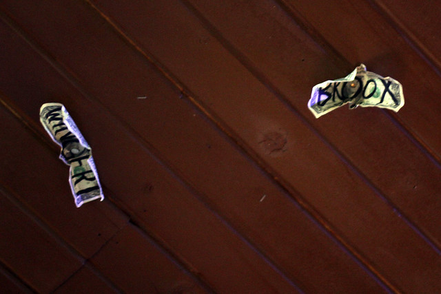 Dollar bills on the ceiling of Front Street