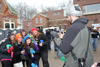 Josh trying to figure out how to take a photo of these girls with their iphone