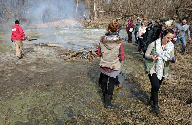 Security busts up the spontaneous bonfire built on the pond