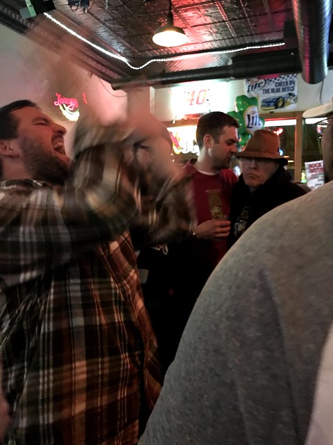 I think Josh is smelling that man’s hat