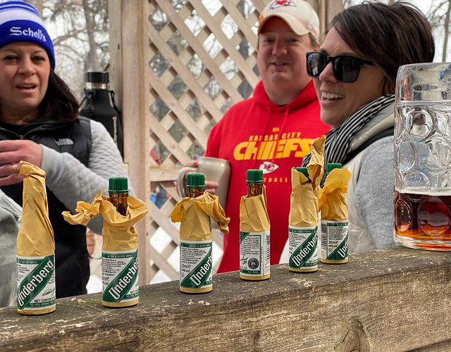 Who brings shots to a drinking fest?