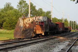 An old train plow and other random cars