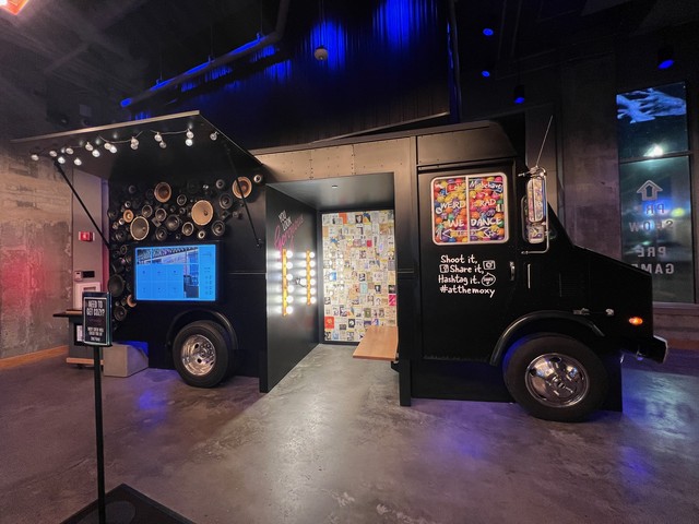 This selfie booth at the Moxy just had a holder for your cell phone, lol