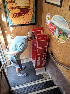 Travis got tired of High Life Lounge, so he went to hang out in this Coca-Cola magazine stand