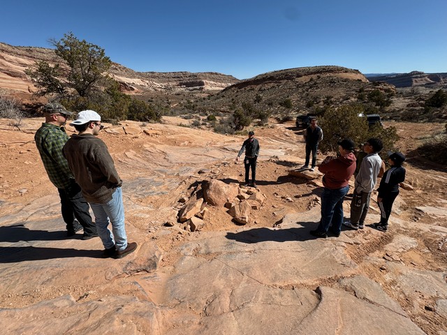 Chatting about obstalces and planning a route up this trail