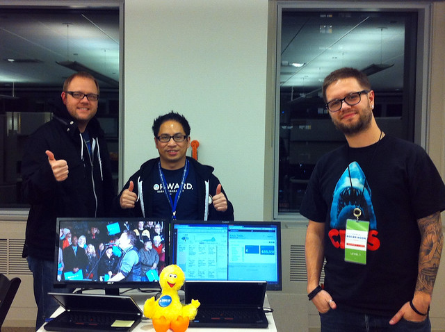 Voter Team in the Boiler Room. Watching the Obama family close the campaign back in Iowa.